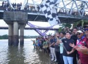 Perlombaan Pacu Sampan Resmi Ditutup Pj Sekda Kampar, Juara 1 Diraih Srigala Muda Dari Siak Hulu